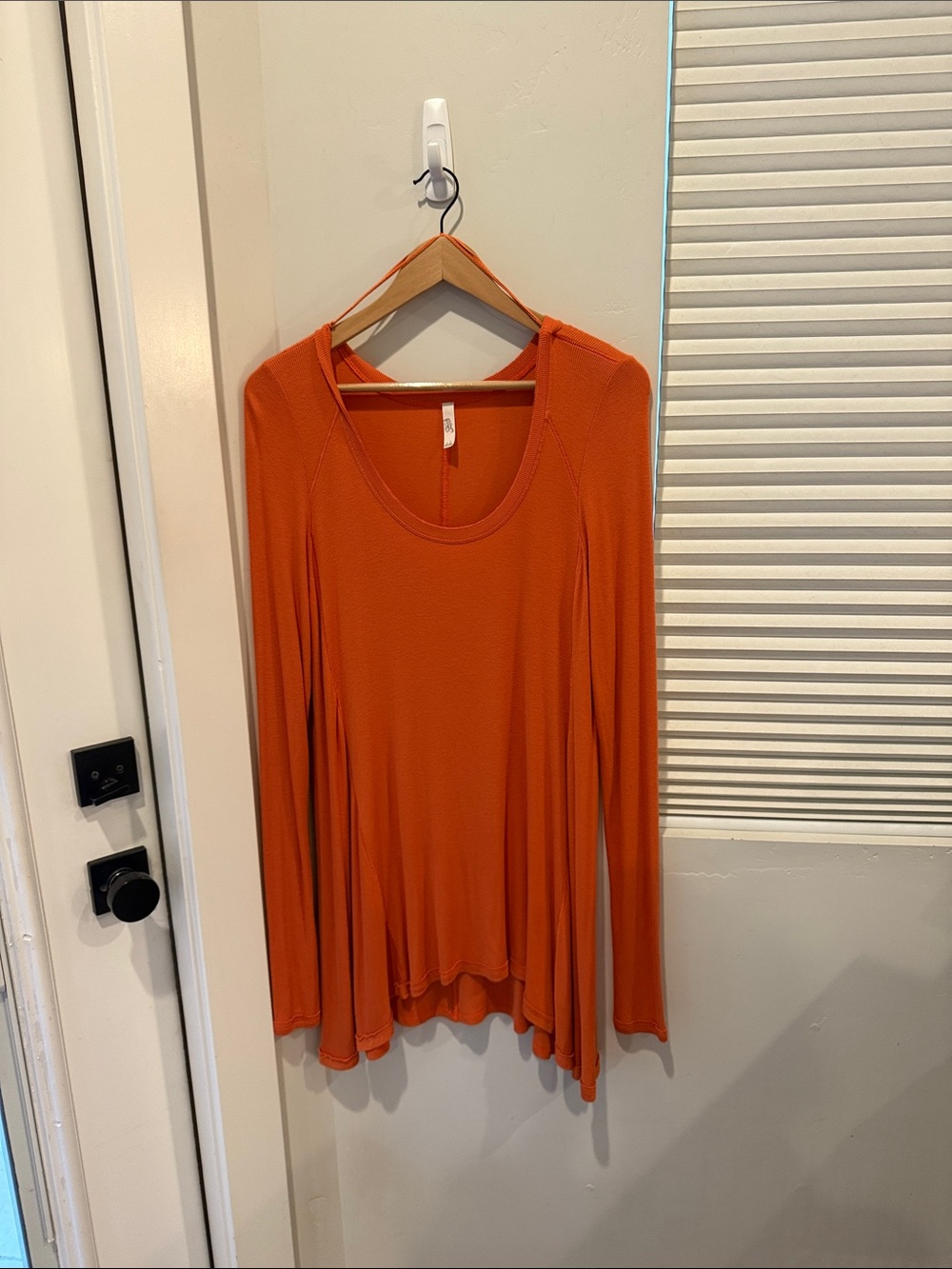 Free People Long Sleeve Scoop Neck Top in Bright Orange